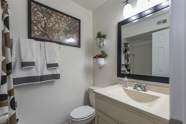 Modern bathroom featuring sleek fixtures and subway tiles at Avana Fieldstone Apartments Perfect blend of style and functionality for luxury living