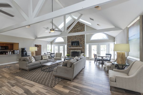 Elegant clubhouse with comfortable seating at Avana Fieldstone Apartments, offering a luxurious community space for socializing and events