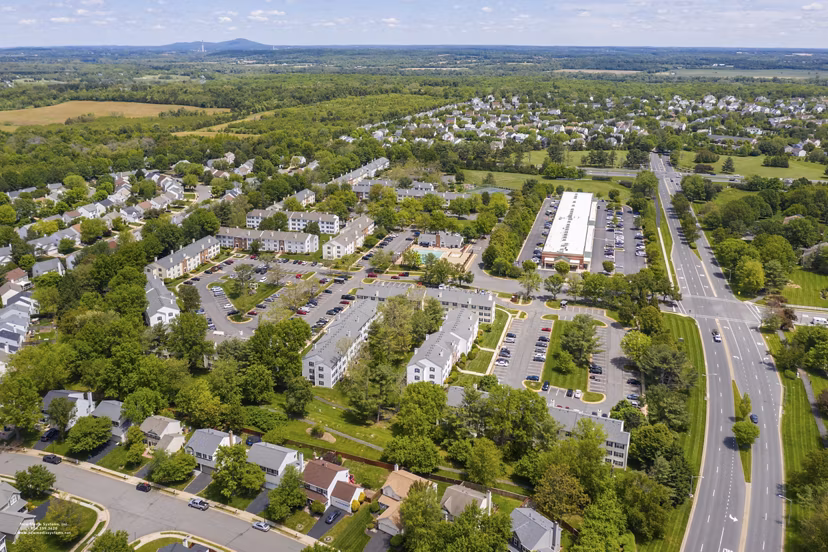 Tranquil courtyard view at Avana Fieldstone Apartments featuring lush landscaping and seating areas