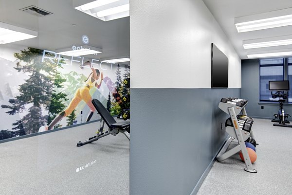 State-of-the-art fitness center with modern equipment at Hanna Heights Apartments in downtown Seattle