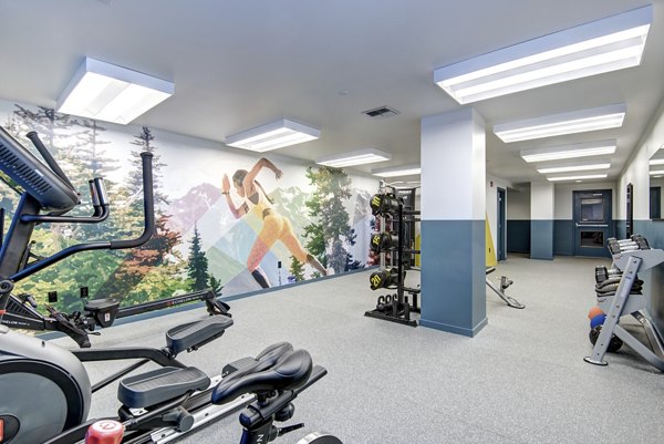 Modern fitness center with state-of-the-art equipment at Hanna Heights Apartments