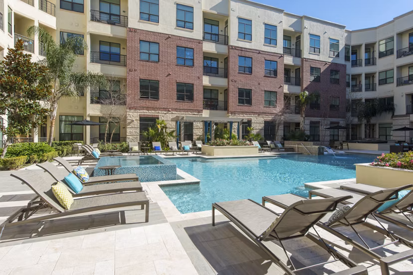 Luxury rooftop pool with city views at Millennium High Street Apartments