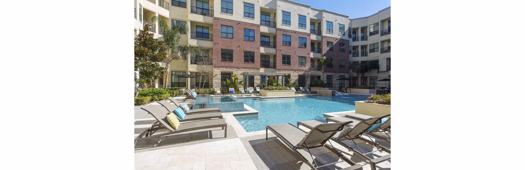 Luxury rooftop pool with city views at Millennium High Street Apartments