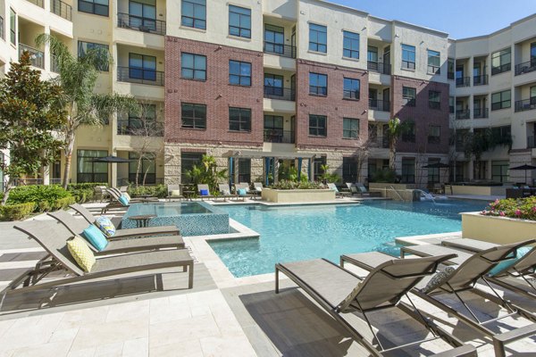 Luxury rooftop pool with city views at Millennium High Street Apartments