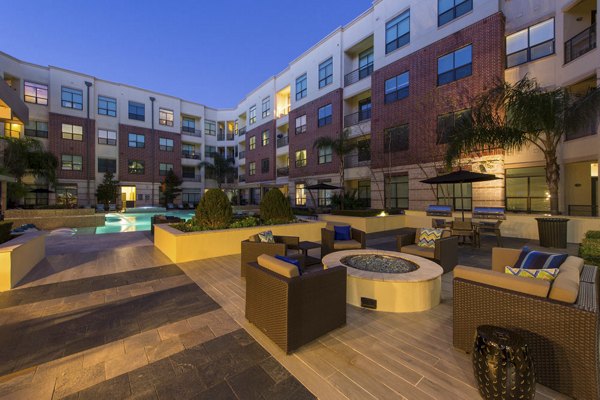 Luxury fitness center with modern equipment at Millennium High Street Apartments