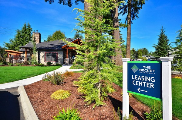 Modern signage at The Becket Apartments, luxury living in a vibrant urban setting