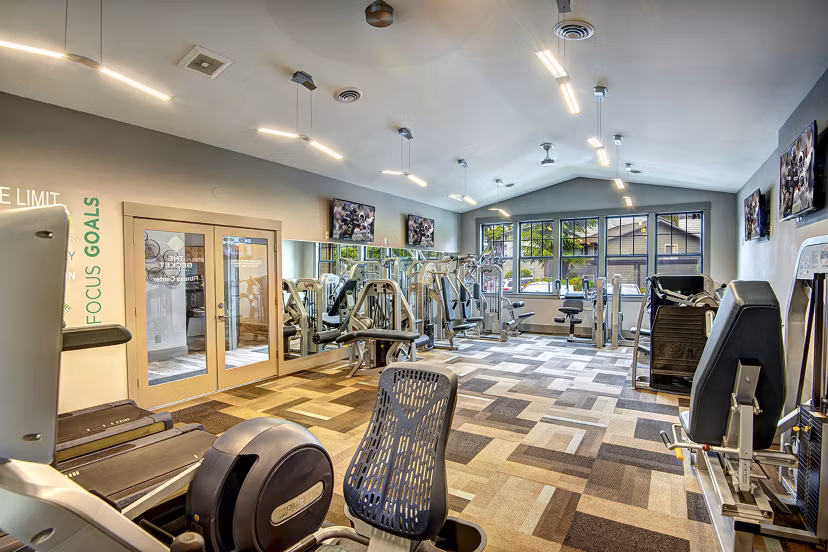 State-of-the-art fitness center at The Becket Apartments with modern exercise equipment