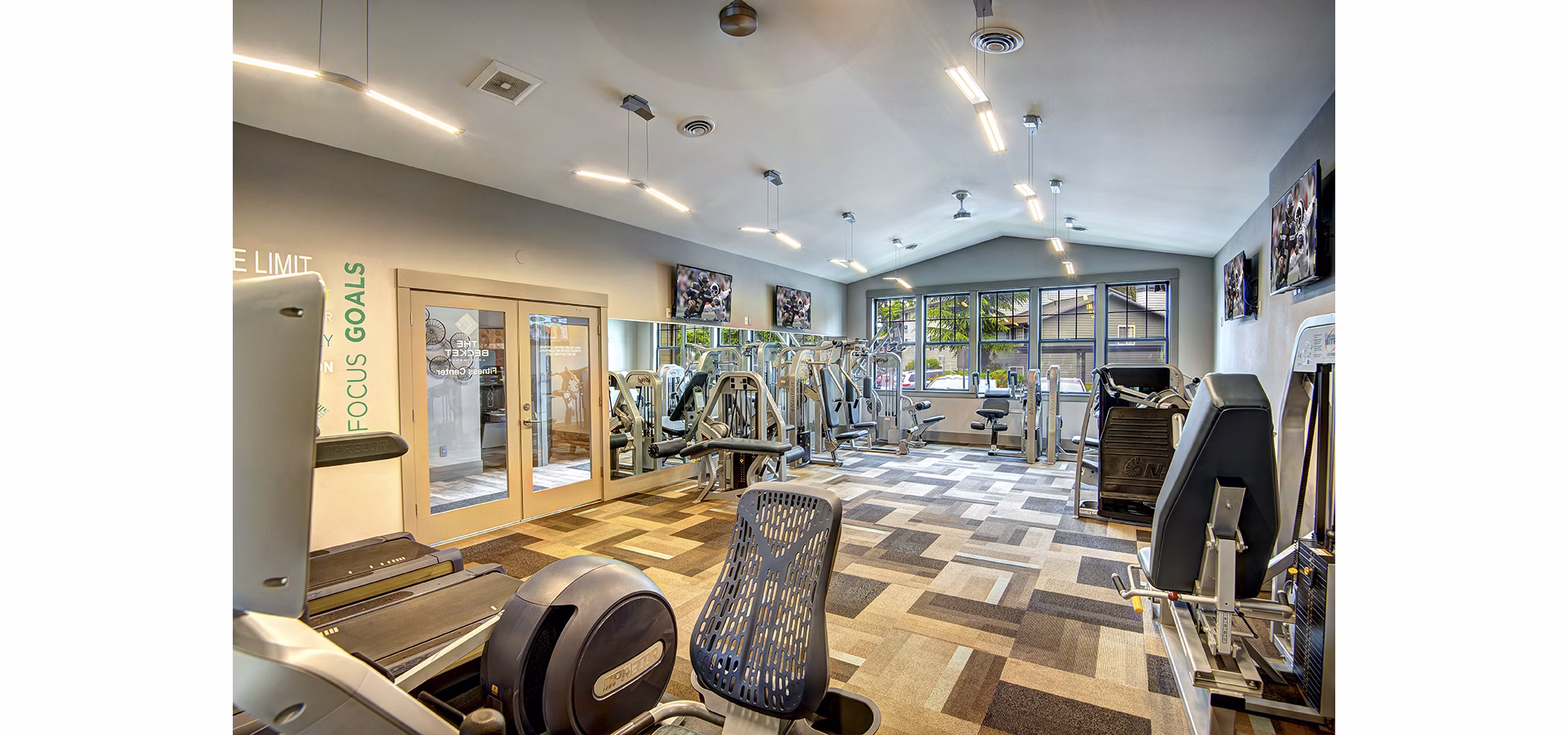 State-of-the-art fitness center at The Becket Apartments with modern exercise equipment