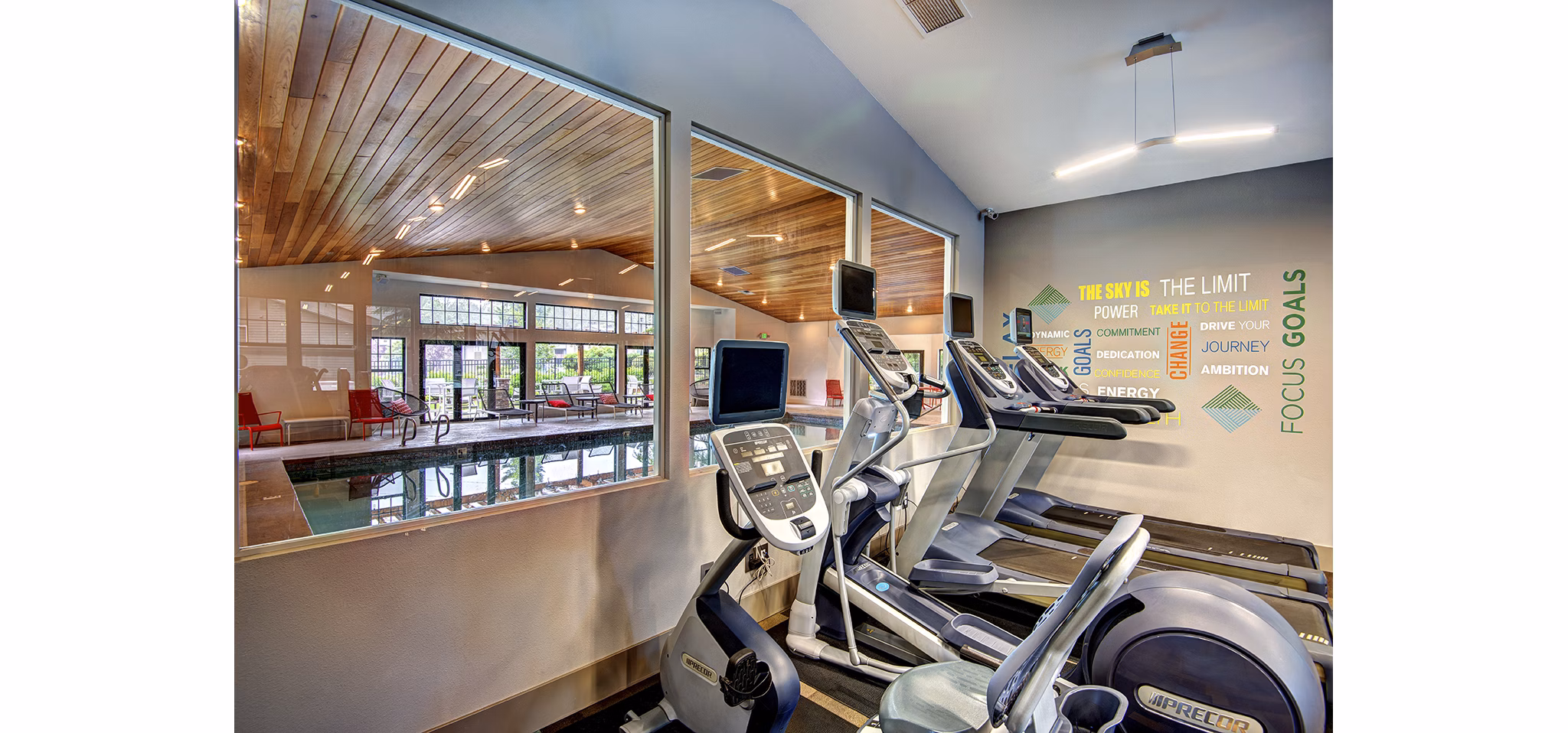 Modern fitness center with state-of-the-art equipment at The Becket Apartments