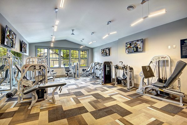 Fitness center featuring top-of-the-line equipment at The Becket Apartments for an active lifestyle