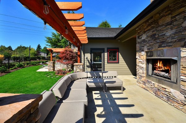 Spacious outdoor patio with modern seating at The Becket Apartments