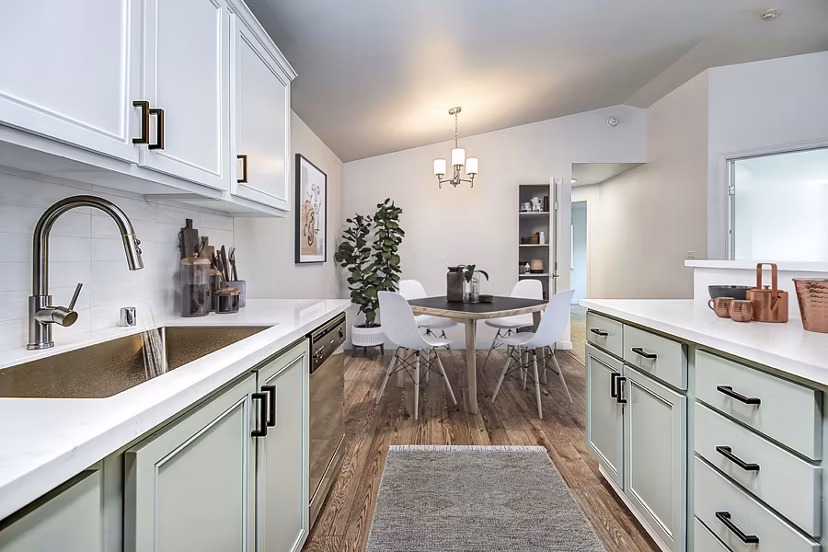 Dining room featuring elegant decor and modern lighting at Smyth Apartments