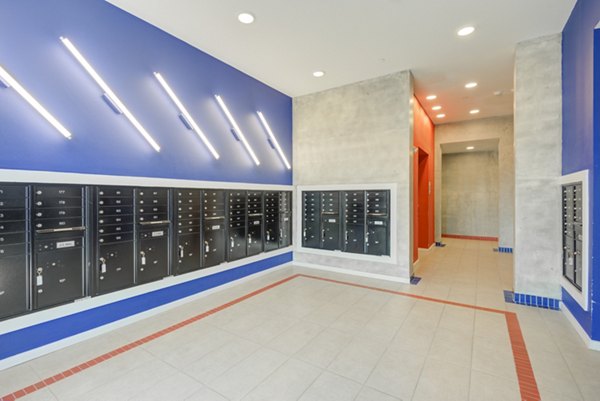 Mail room with secure parcel lockers at Encore Panther Island Apartments