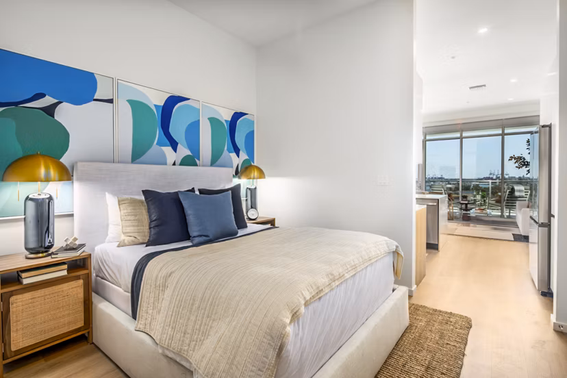 Modern bedroom with ocean views at 200 West Ocean Apartments, showcasing luxury living in Long Beach