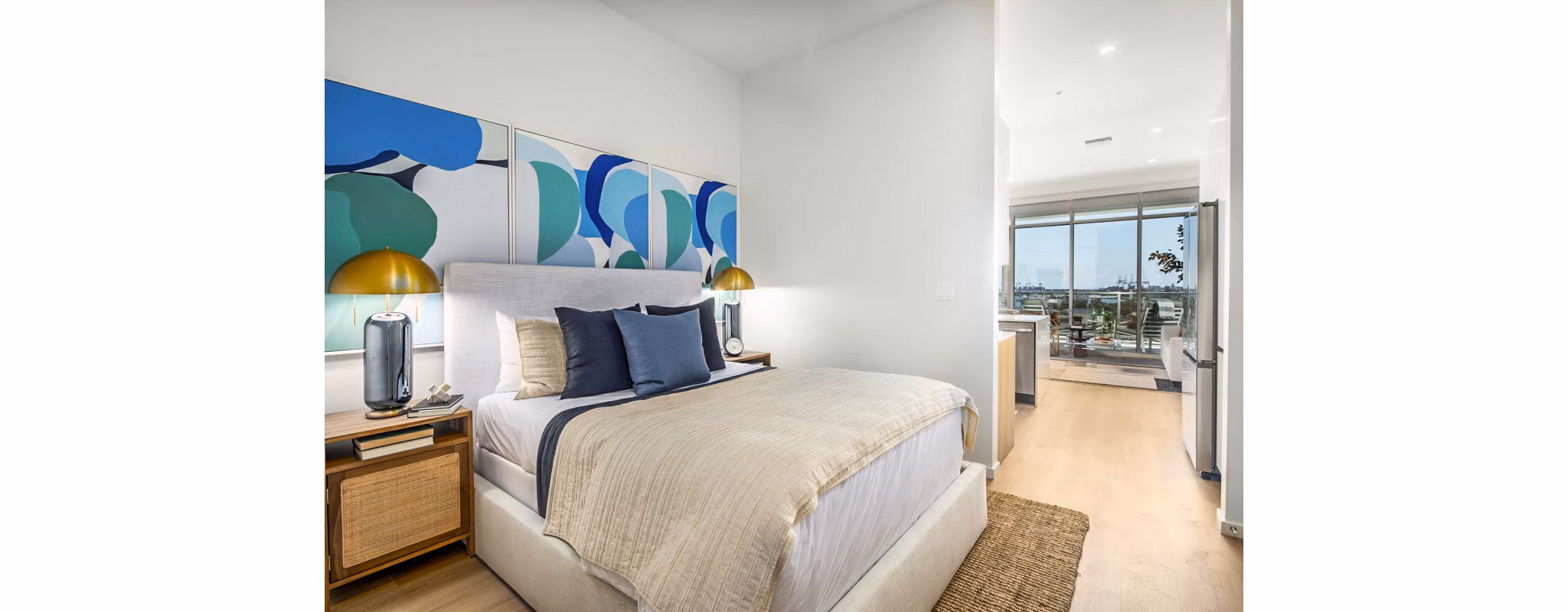 Modern bedroom with ocean views at 200 West Ocean Apartments, showcasing luxury living in Long Beach