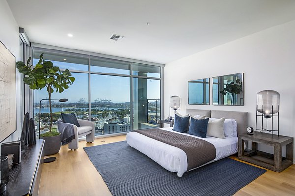 Elegant bedroom with ocean views at 200 West Ocean Apartments