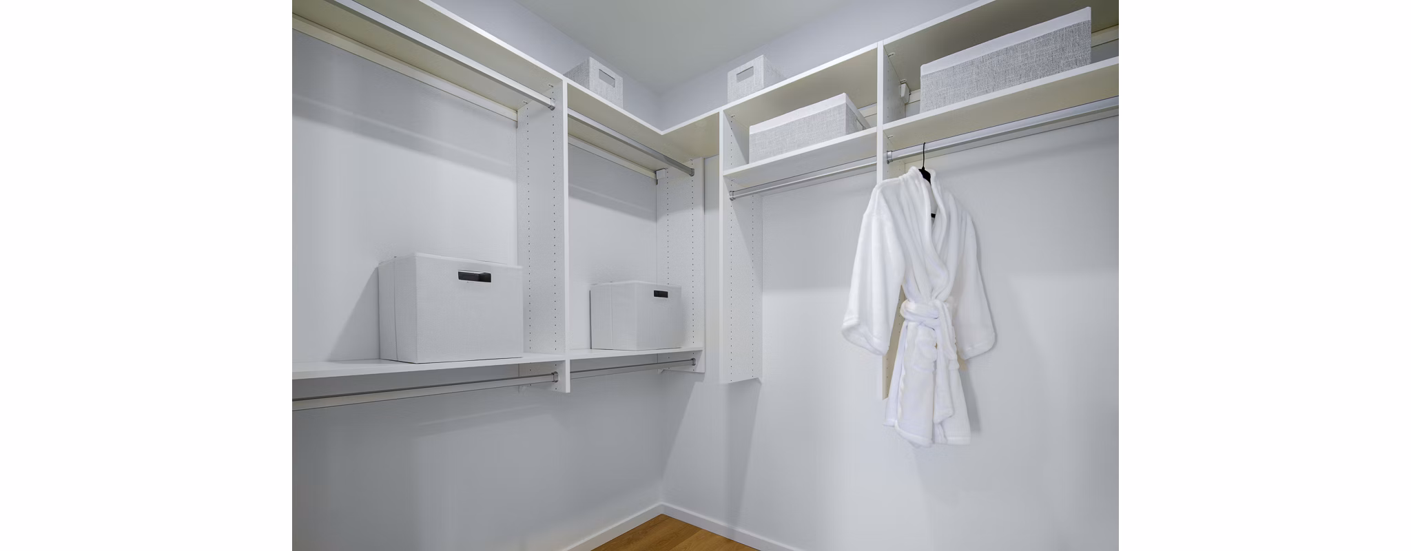 Spacious bedroom closet with built-in shelving at 200 West Ocean Apartments