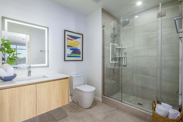 Bathroom featuring modern fixtures and sleek design at 200 West Ocean Apartments