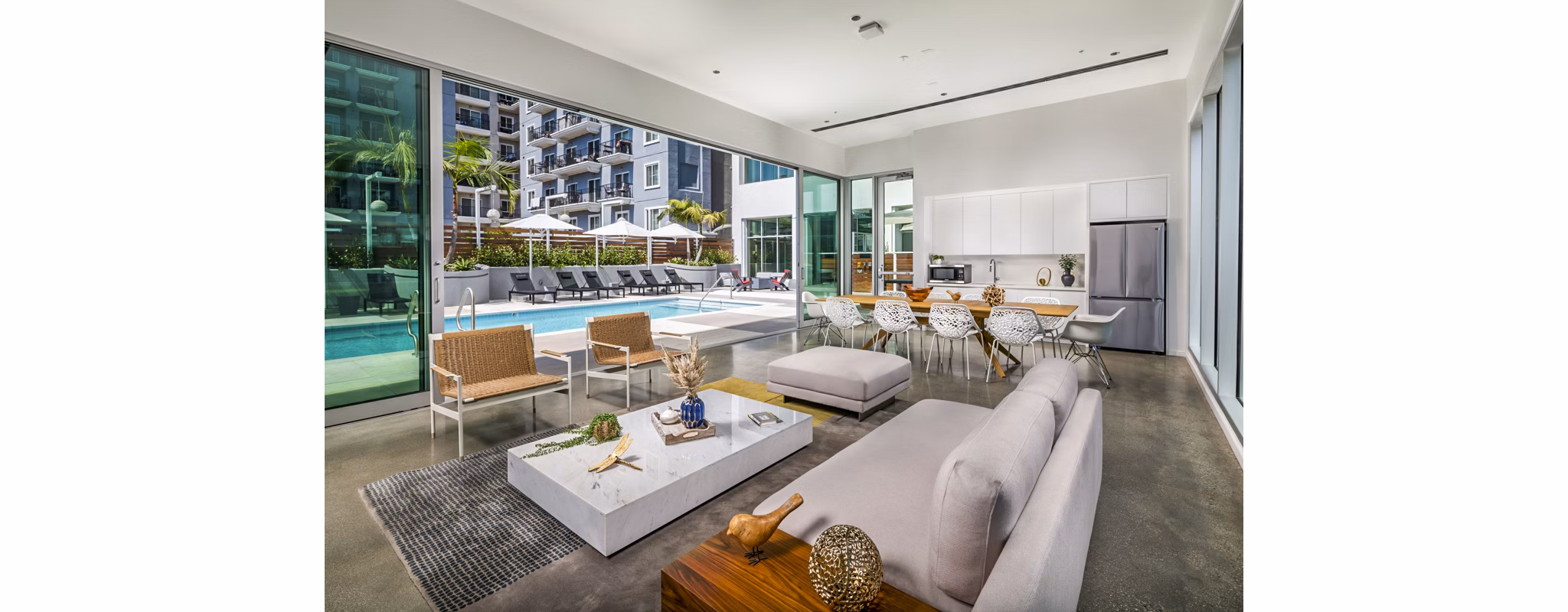 Clubhouse patio with seating and ocean views at 200 West Ocean Apartments, perfect for relaxation and socializing