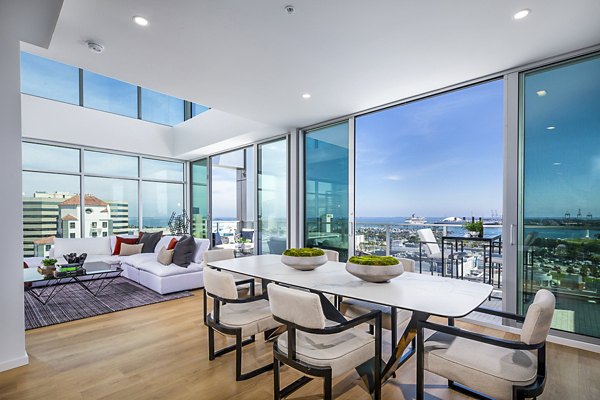 Dining area with modern decor and elegant lighting at 200 West Ocean Apartments
