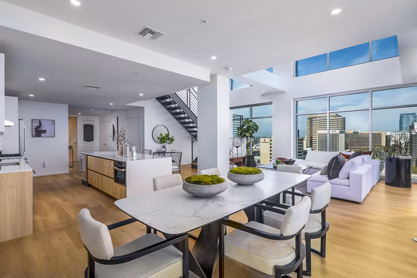 Dining room with modern decor and sleek furnishings at 200 West Ocean Apartments