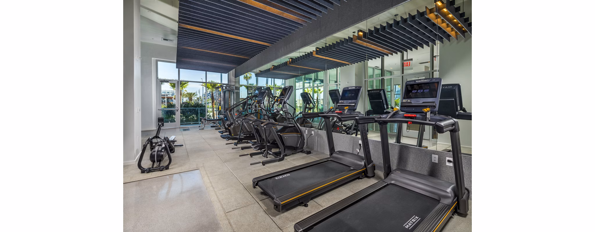 State-of-the-art fitness center at 200 West Ocean Apartments featuring modern exercise equipment and spacious workout areas