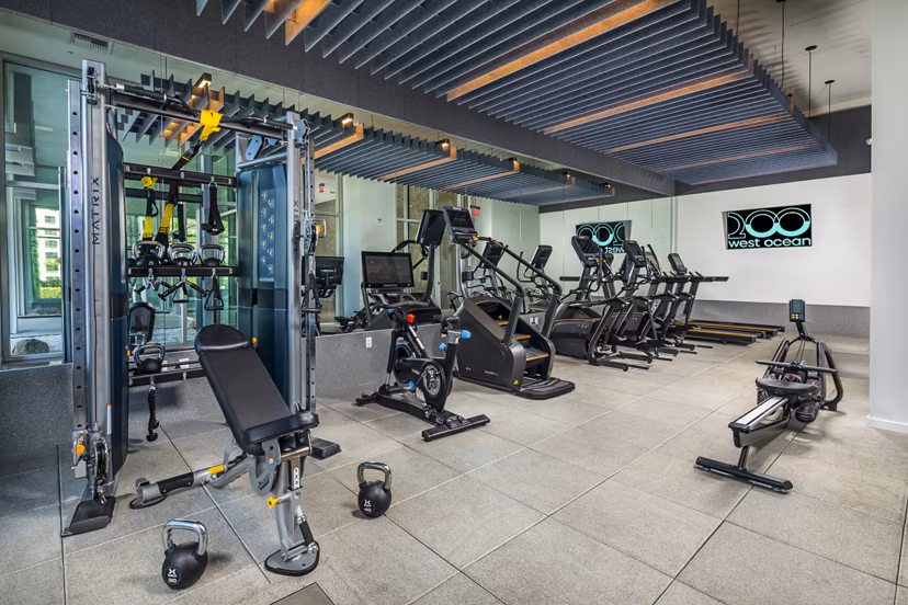 Fitness center with modern equipment at 200 West Ocean Apartments, offering state-of-the-art facilities for active living and wellness