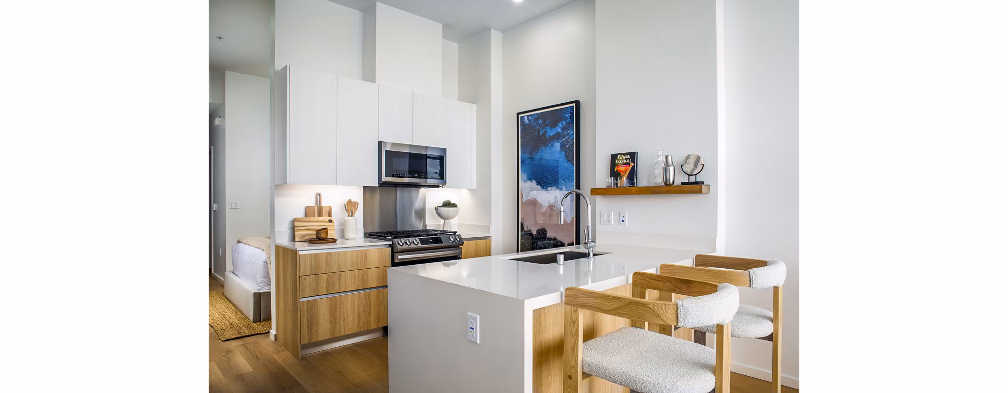 Modern kitchen with sleek cabinetry and stainless steel appliances at 200 West Ocean Apartments, a Greystar luxury residence