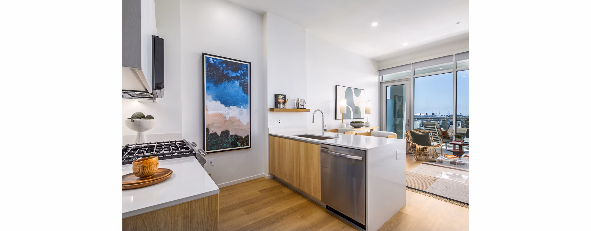 Modern kitchen with sleek cabinetry and stainless steel appliances at 200 West Ocean Apartments