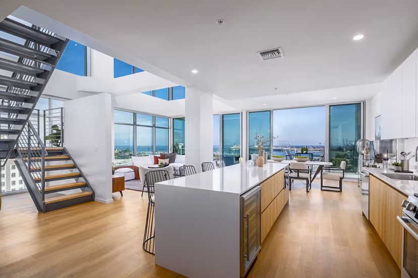 Modern kitchen with stainless steel appliances at 200 West Ocean Apartments in luxury Greystar community