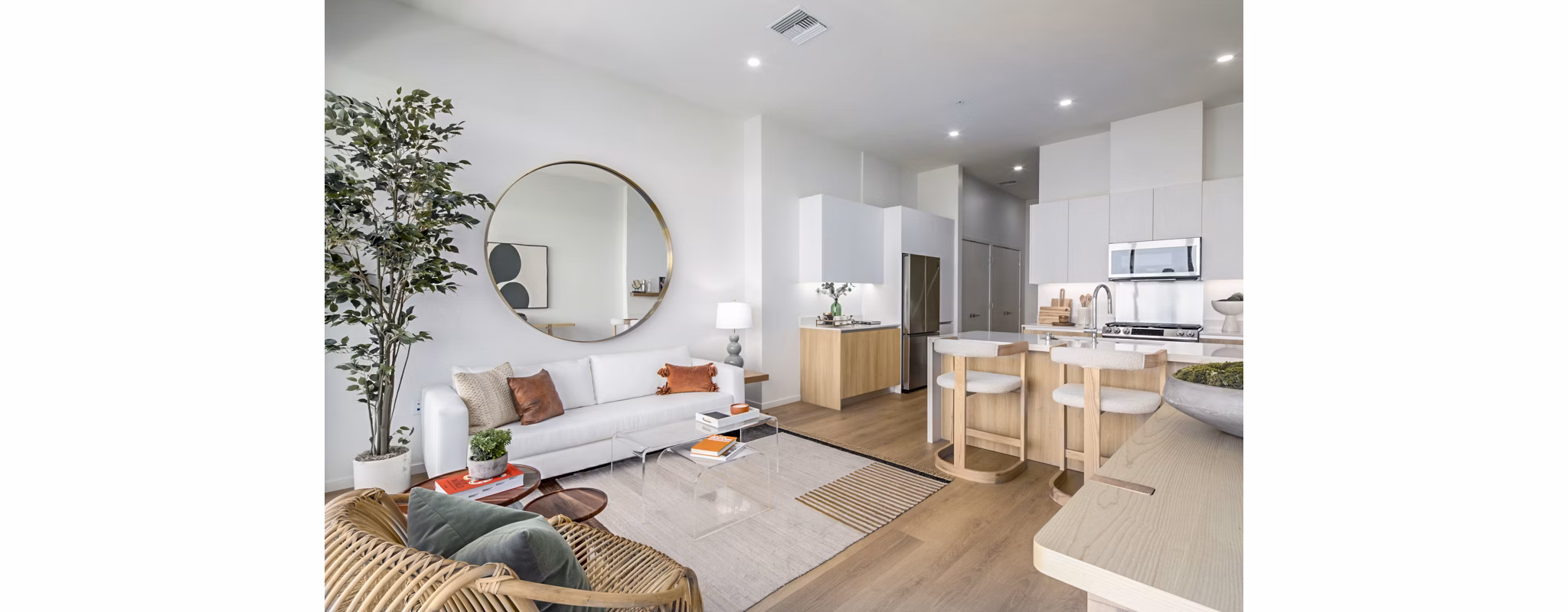 Spacious living room with ocean views at 200 West Ocean Apartments