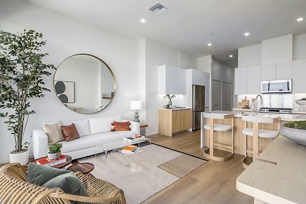 Spacious living room with ocean views at 200 West Ocean Apartments