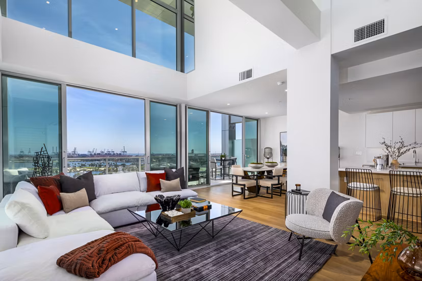 Spacious living room with modern decor at 200 West Ocean Apartments