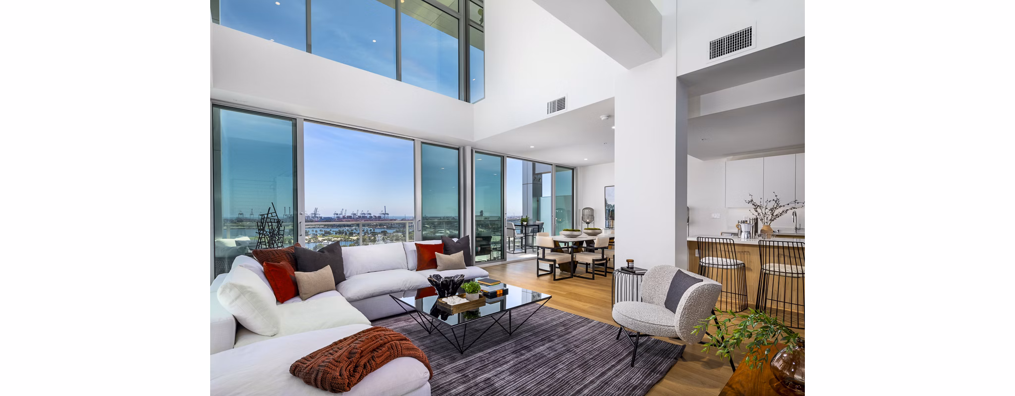 Spacious living room with modern decor at 200 West Ocean Apartments