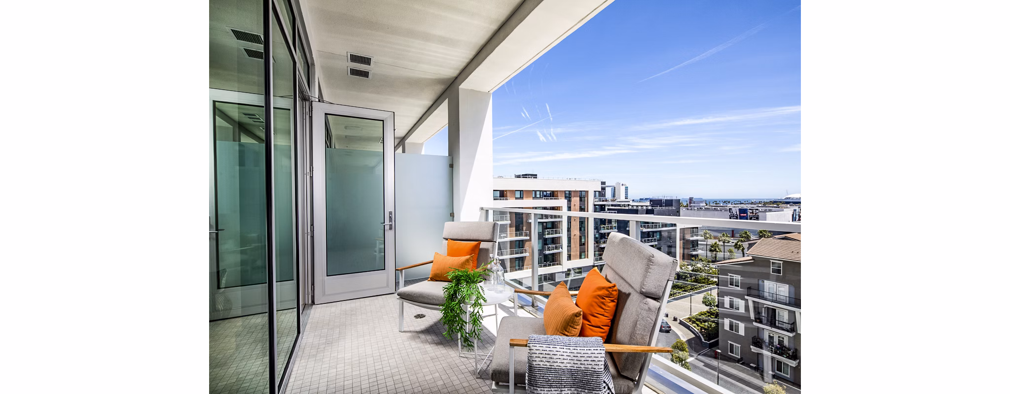 Private balcony with stunning ocean views at 200 West Ocean Apartments