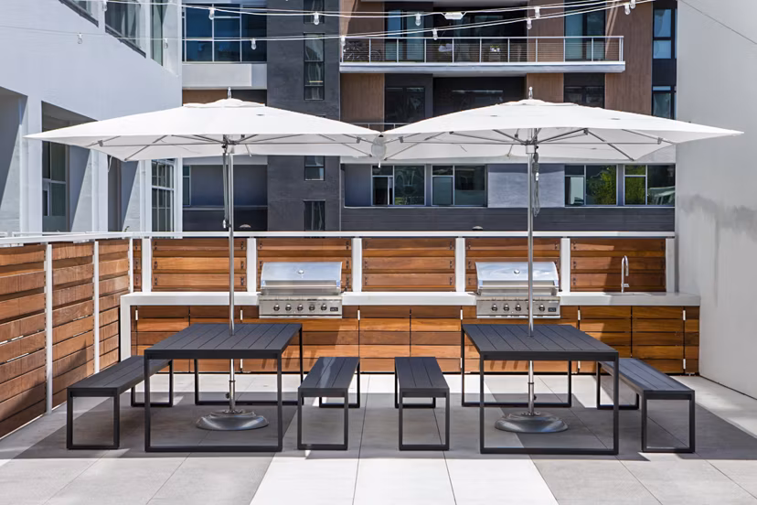 Outdoor grill area on the patio at 200 West Ocean Apartments, perfect for social gatherings and enjoying alfresco dining
