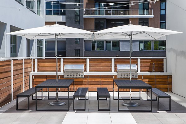 Outdoor grill area on the patio at 200 West Ocean Apartments, perfect for social gatherings and enjoying alfresco dining
