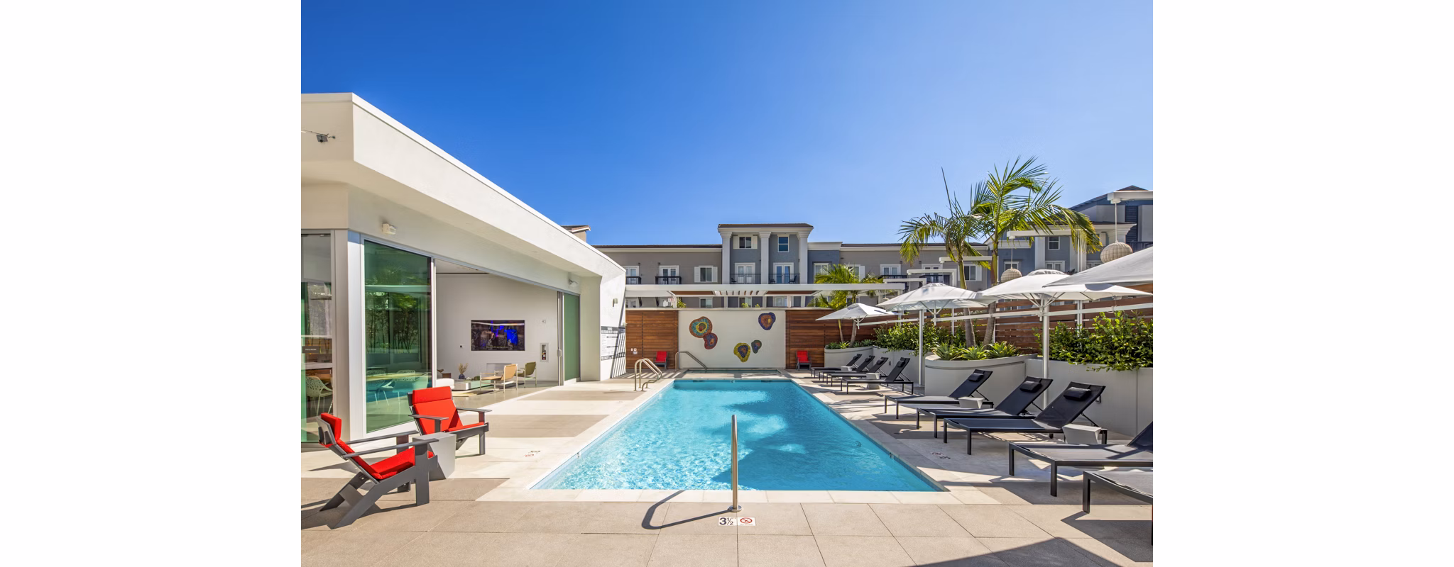 Luxurious rooftop pool with ocean views at 200 West Ocean Apartments