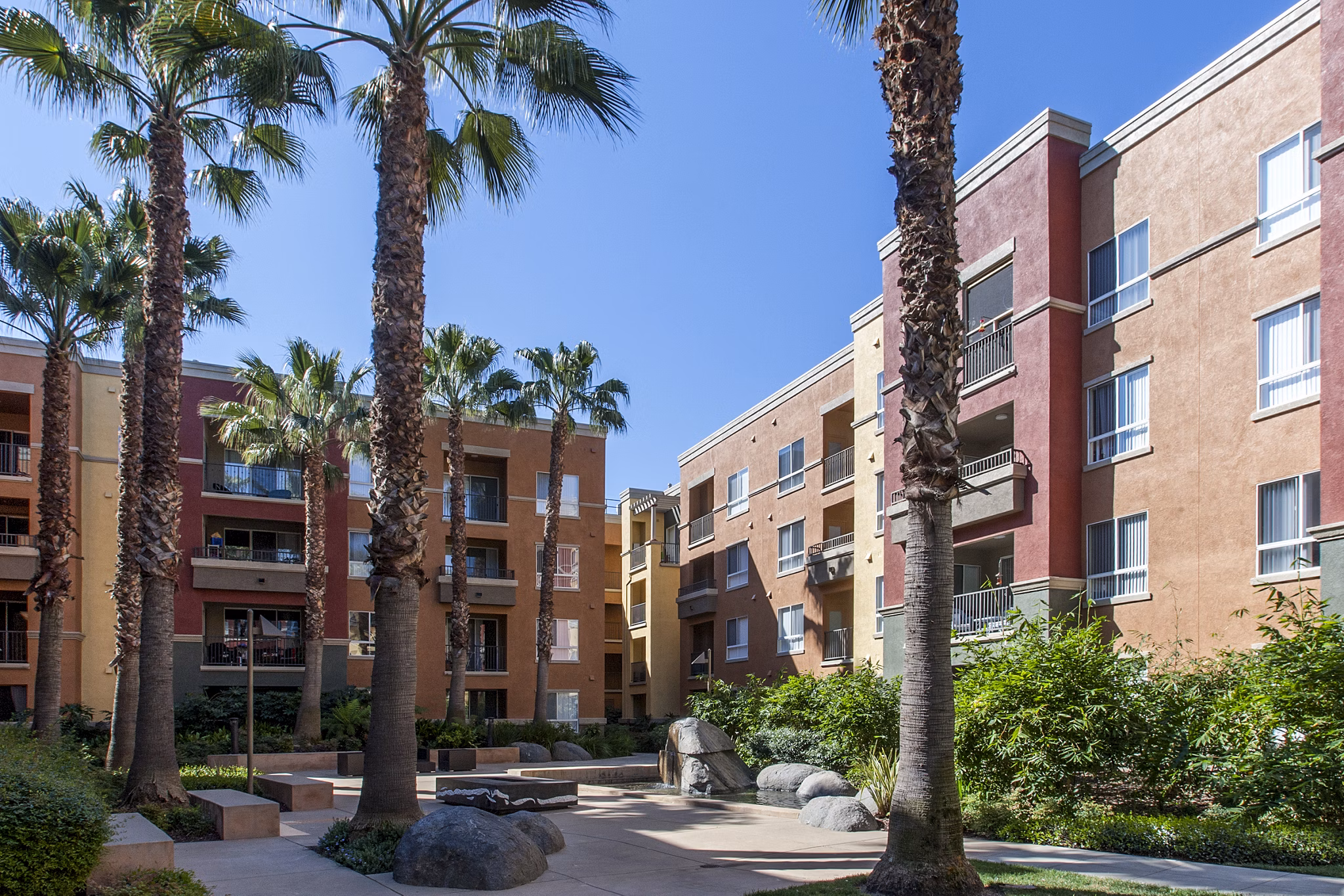 Waterford Place Apartments: Elegant view of luxury apartments in a vibrant urban setting