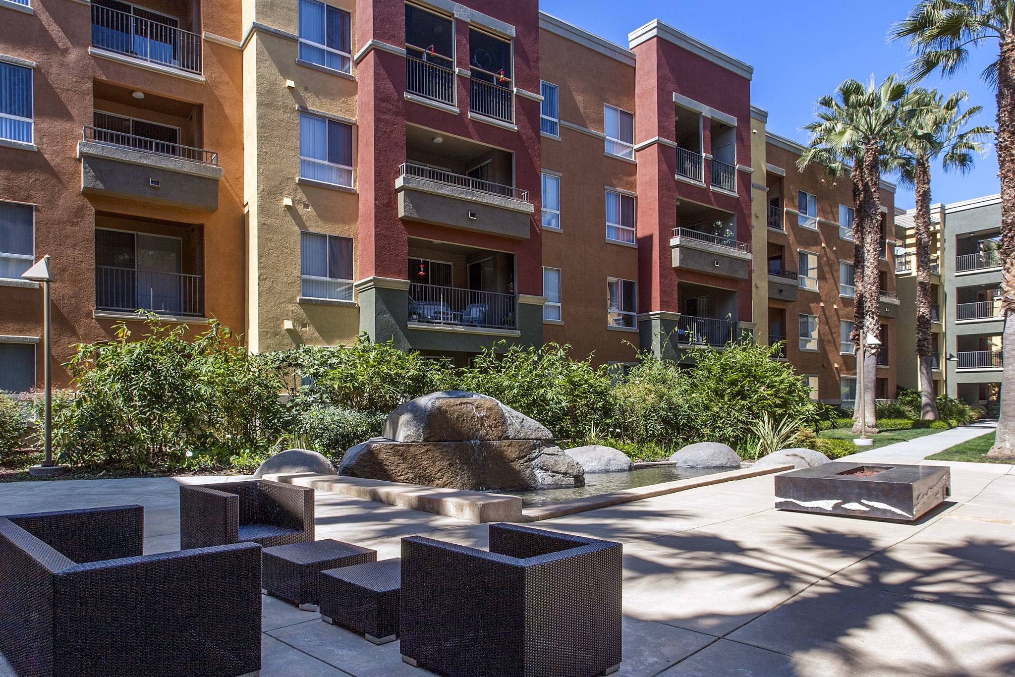 Waterford Place Apartments: Elegant courtyard view and modern architecture in urban setting