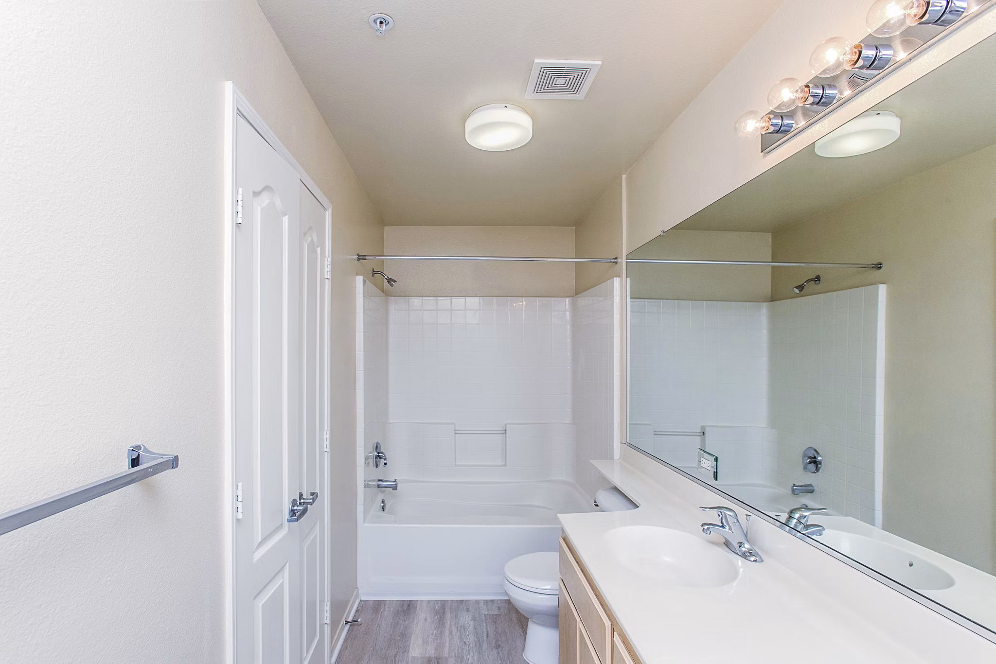 Modern bathroom featuring sleek fixtures at Waterford Place Apartments, highlighting luxury living and contemporary design