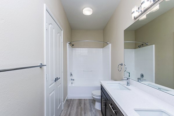 Bathroom featuring modern fixtures and elegant design at Waterford Place Apartments