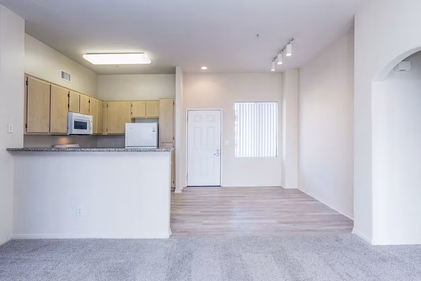 Dining room with elegant furniture at Waterford Place Apartments, offering luxury living in a sophisticated setting