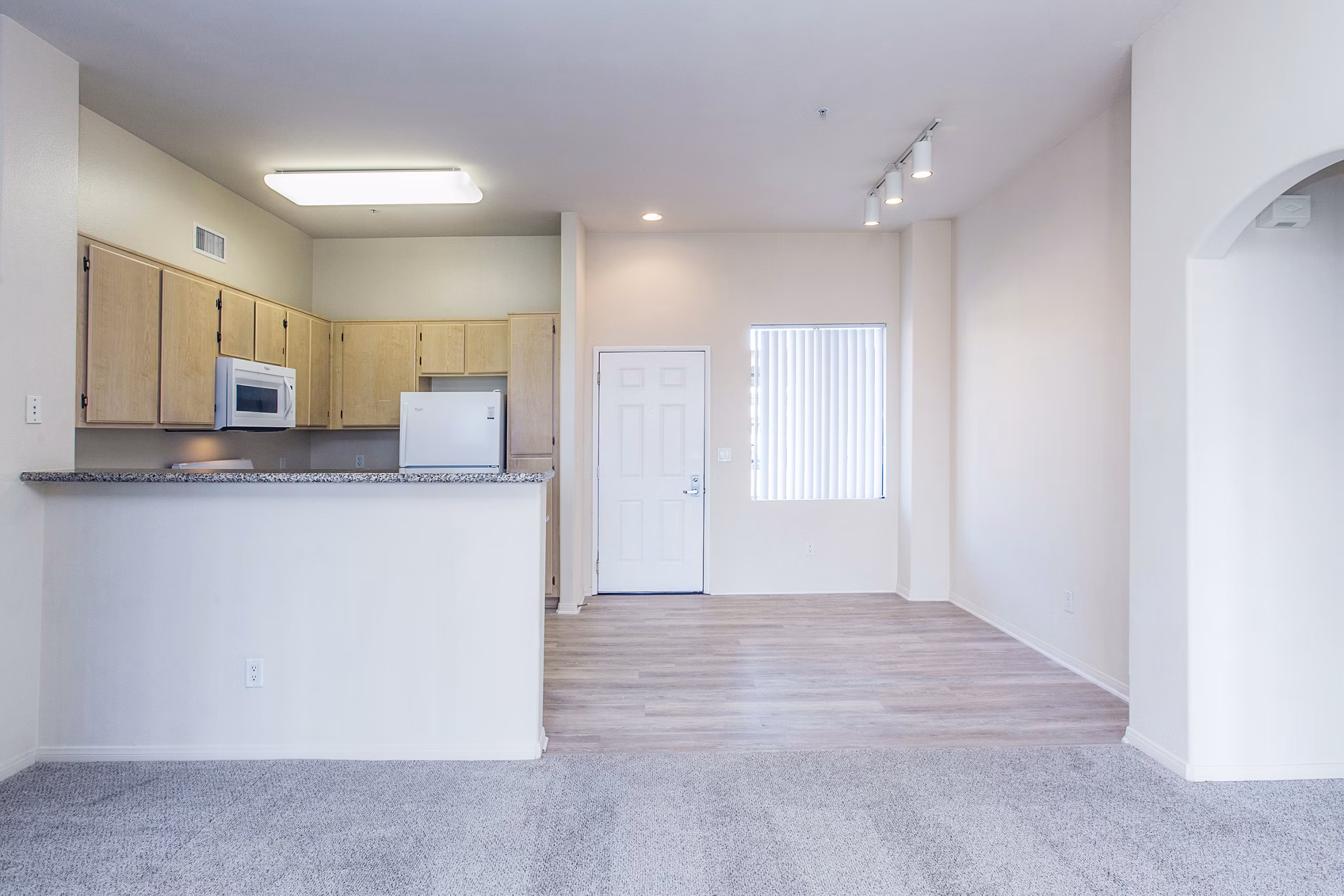 Dining room with elegant furniture at Waterford Place Apartments, offering luxury living in a sophisticated setting
