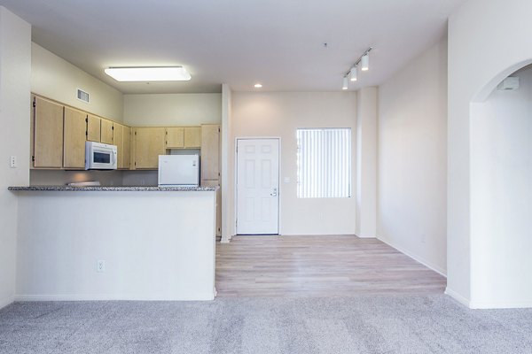 Dining room with elegant furniture at Waterford Place Apartments, offering luxury living in a sophisticated setting