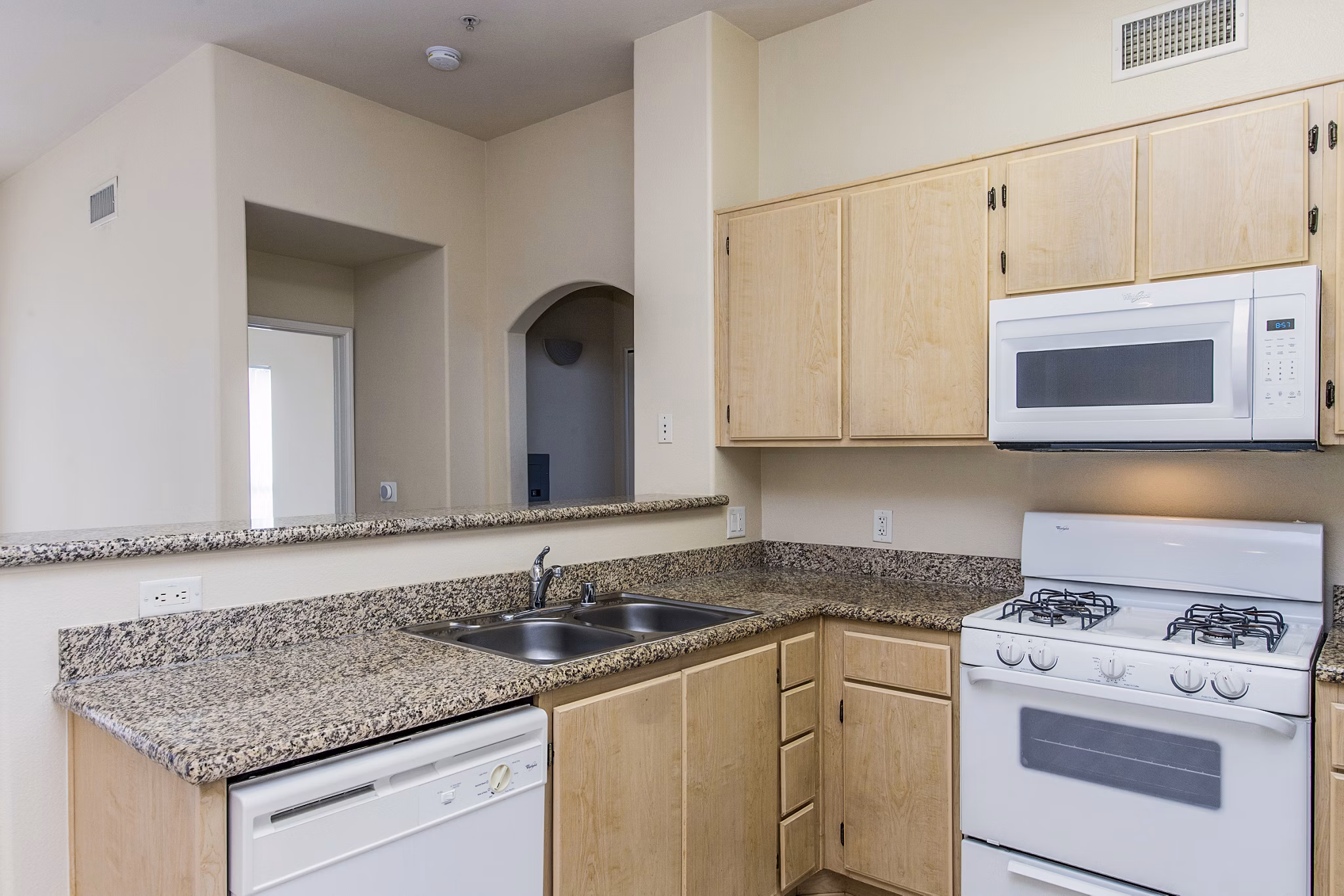 Modern kitchen featuring stainless steel appliances at Waterford Place Apartments