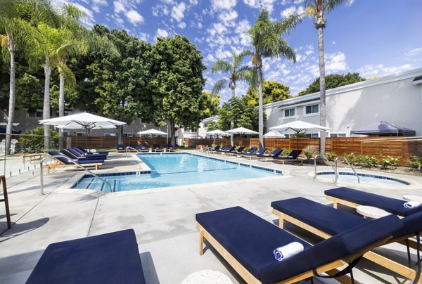 Expansive resort-style pool at The Breakwater Apartments offering luxury relaxation and leisure amenities