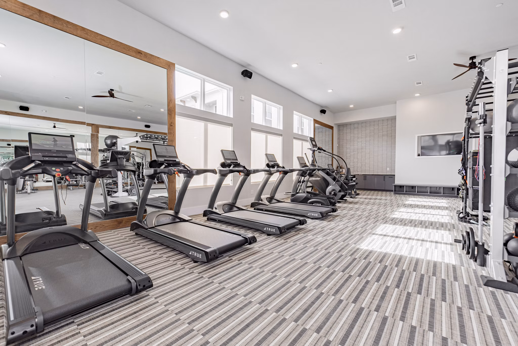 fitness center at Elan Denton Apartments