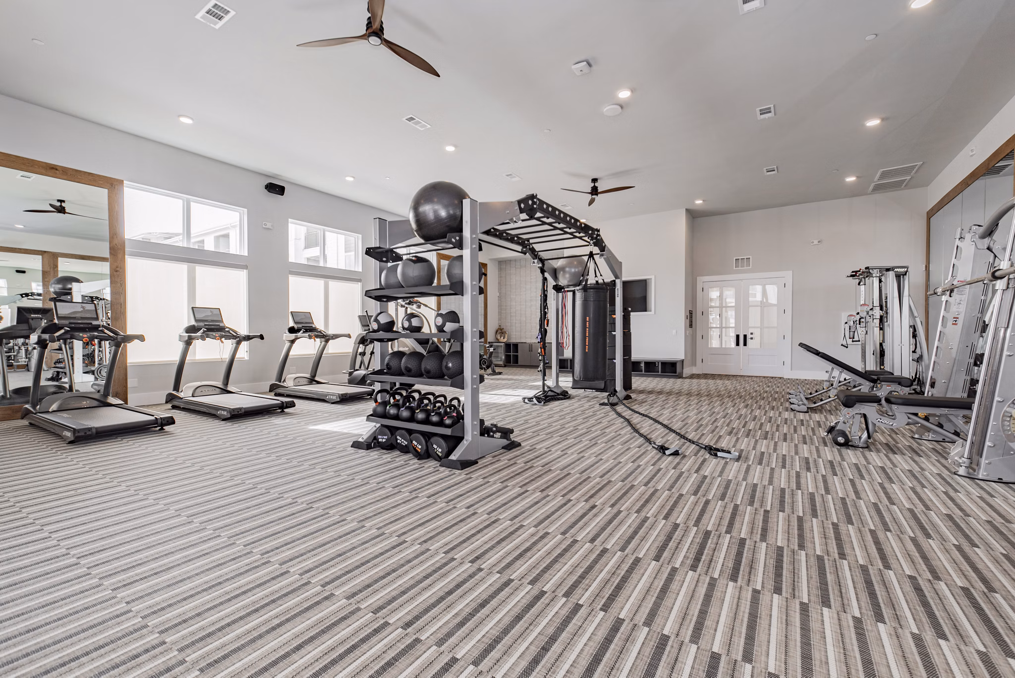 fitness center at Elan Denton Apartments