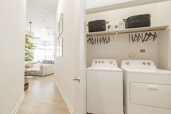 laundry room at Elan Denton Apartments